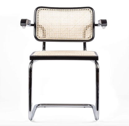 Silla de comedor italiana en ratán con reposabrazos - Cesca