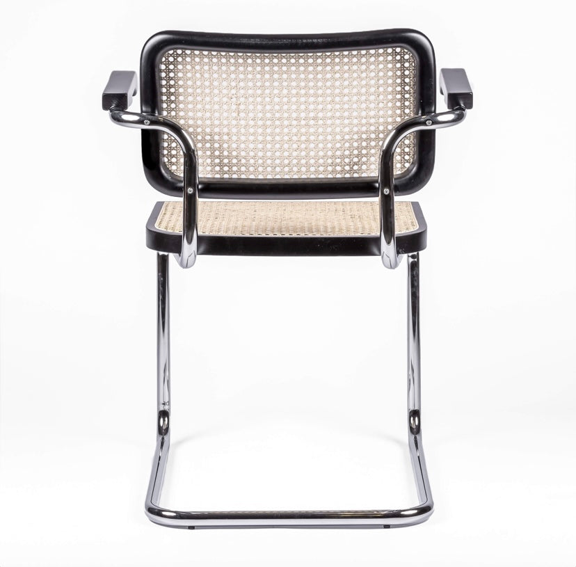 Silla de comedor italiana en ratán con reposabrazos - Cesca